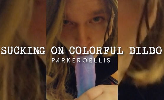 Sucking On Colorful Dildo